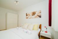 Posteľ alebo postele v izbe v ubytovaní Apartment Big Look