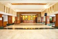 a lobby of a hotel building with a lobby at Welcomhotel by ITC Hotels, Alkapuri, Vadodara in Vadodara