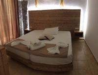 Postel nebo postele na pokoji v ubytování Villa Livadaros