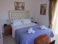 Posteľ alebo postele v izbe v ubytovaní Irida Beach Resort Suites