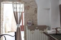 A bed or beds in a room at Residenze nei Trulli