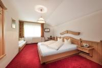 Łóżko lub łóżka w pokoju w obiekcie Das Wismeyer - Skihotel an der Plattenkarbahn