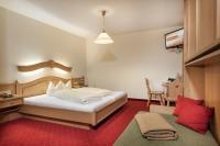 Łóżko lub łóżka w pokoju w obiekcie Das Wismeyer - Skihotel an der Plattenkarbahn