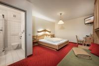 Łóżko lub łóżka w pokoju w obiekcie Das Wismeyer - Skihotel an der Plattenkarbahn
