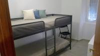 A bed or beds in a room at Appartamenti La Quiete