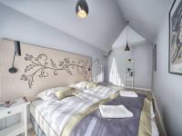 Posteľ alebo postele v izbe v ubytovaní VisitZakopane - Mountain Pass Apartment