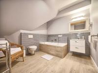 Kúpeľňa v ubytovaní VisitZakopane - Mountain Pass Apartment