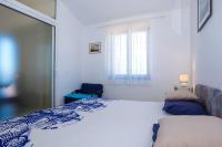 Posteľ alebo postele v izbe v ubytovaní Vidučić Apartments