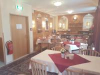 A restaurant or other place to eat at Hotel Haydn