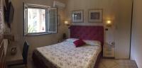A bed or beds in a room at B&B Primerano SP73