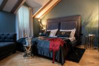 Posteľ alebo postele v izbe v ubytovaní Heritage Hotel 19
