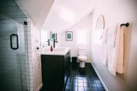a bathroom with a sink and a toilet at Noon on Sunset Hill in Los Angeles
