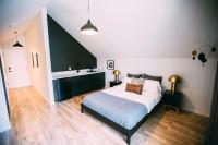 a bedroom with a large bed in a room at Noon on Sunset Hill in Los Angeles