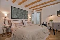 Posteľ alebo postele v izbe v ubytovaní Heritage Hotel 19