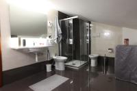 A bathroom at Amira Luxury Apartments