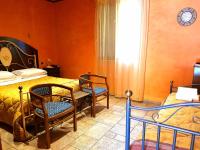Posteľ alebo postele v izbe v ubytovaní Hotel Villa Elisabetta