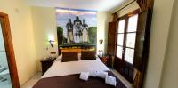 Posteľ alebo postele v izbe v ubytovaní Hotel Casa Museo de la Mezquita