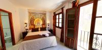 Posteľ alebo postele v izbe v ubytovaní Hotel Casa Museo de la Mezquita