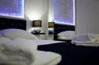 Postel nebo postele na pokoji v ubytování Apartments Taratta 1