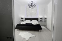 Postel nebo postele na pokoji v ubytování Apartments Taratta 1
