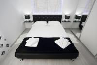 Postel nebo postele na pokoji v ubytování Apartments Taratta 1