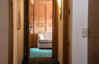A bed or beds in a room at Hotel Kristall