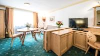 A television and/or entertainment centre at Hotel Kristall