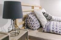 Posteľ alebo postele v izbe v ubytovaní Golden Hand Luxury Apartment