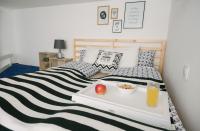 Posteľ alebo postele v izbe v ubytovaní Golden Hand Luxury Apartment