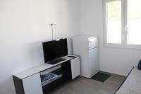 TV a/nebo společenská místnost v ubytování Apartment Tonka