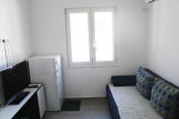 TV a/nebo společenská místnost v ubytování Apartment Tonka