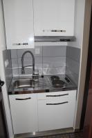 Kuchyň nebo kuchyňský kout v ubytování Apartment Tonka