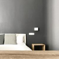 A bed or beds in a room at Serendipity