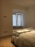 Posteľ alebo postele v izbe v ubytovaní Fafà Apartment