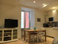 Televízia a/alebo spoločenská miestnosť v ubytovaní Fafà Apartment