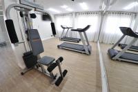a gym with several treadmills and exercise bikes at Klein Ville São Leopoldo in São Leopoldo