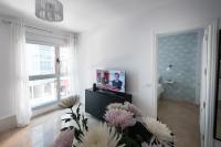 A television and/or entertainment centre at Las Palmas Lighthouse Apartment