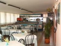 Hotel Baia Verdeにあるレストランまたは飲食店