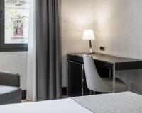 A bed or beds in a room at Ilunion Bel-Art