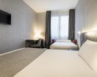 A bed or beds in a room at Ilunion Bel-Art