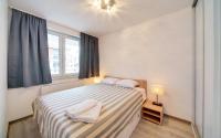 Posteľ alebo postele v izbe v ubytovaní Funkcjonalne i Komfortowe Apartamenty Sun Seasons 24 w Kołobrzegu by Noclegi Renters