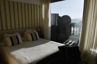 Postel nebo postele na pokoji v ubytování Gran Hotel Sardinero