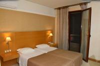 Posteľ alebo postele v izbe v ubytovaní Deves Hotel