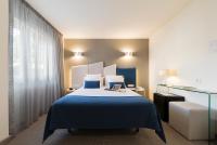 Posteľ alebo postele v izbe v ubytovaní Hotel Boa Vista