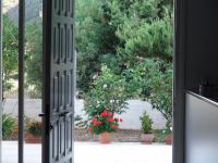 A garden outside Filoxenia Hotel & Apartments