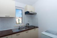 Kuchyňa alebo kuchynka v ubytovaní Apartments Fumija