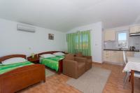 Kuchyňa alebo kuchynka v ubytovaní Apartments Fumija