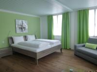 Postel nebo postele na pokoji v ubytování Hotel Metzgern