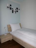 Postel nebo postele na pokoji v ubytování Hotel Metzgern