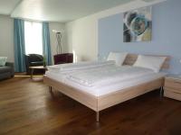 Postel nebo postele na pokoji v ubytování Hotel Metzgern